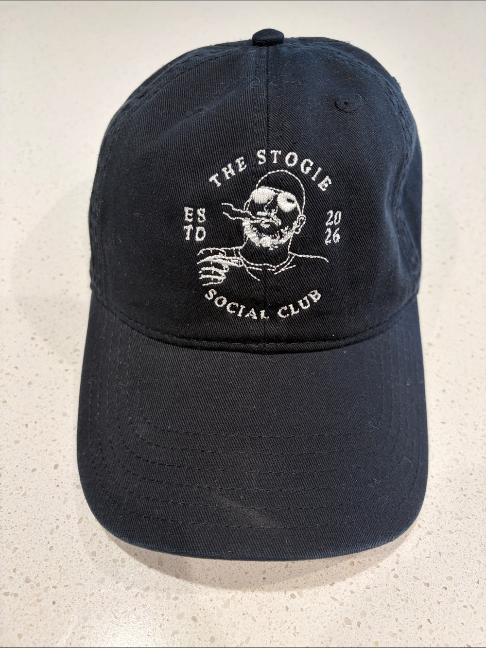 Black Embroidered “The Stogie”
Dad Cap.
